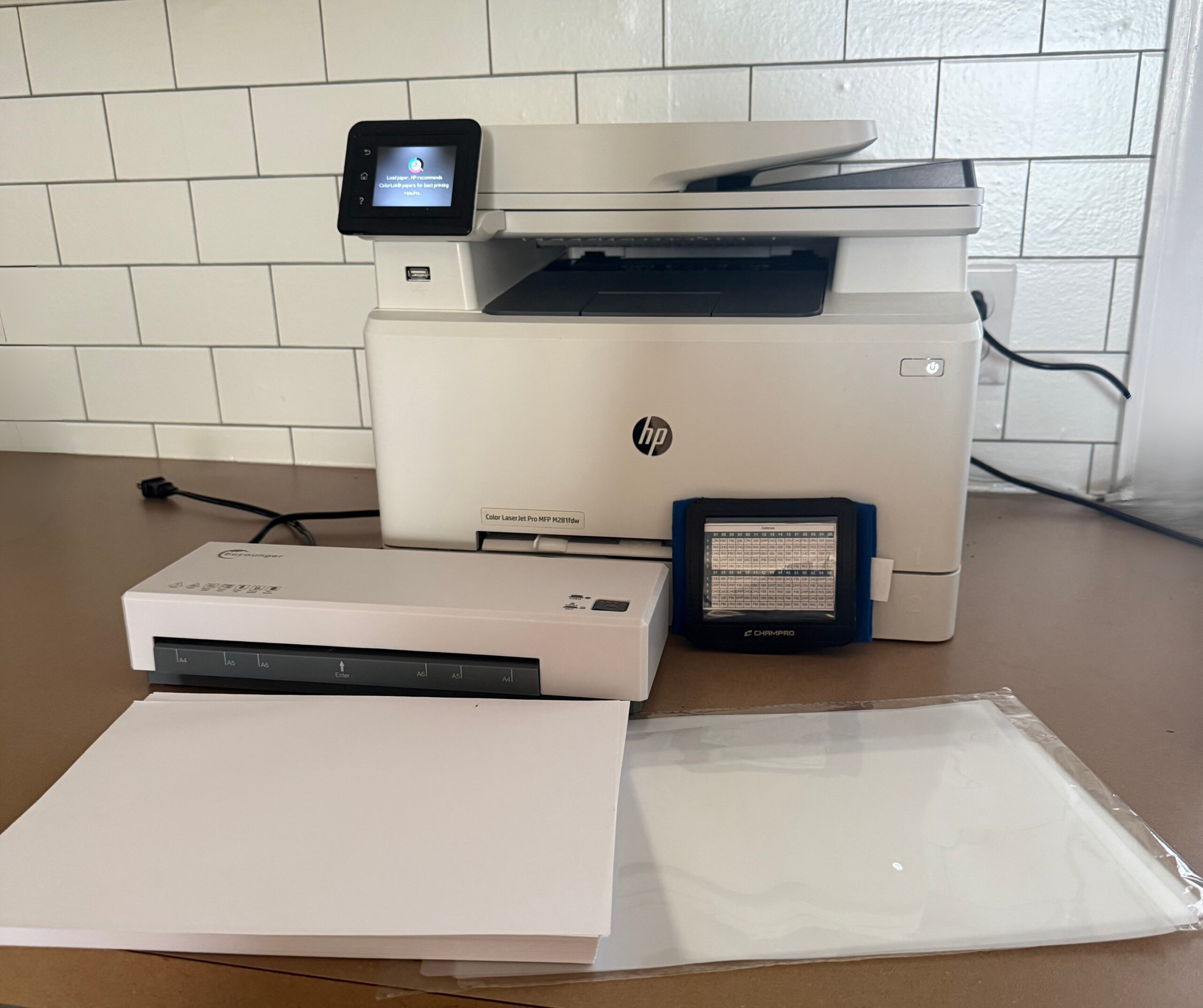 Baseball wristband supplies — printer, wristband sleeves, laminator, and laminating pouches
